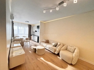 Apartament 3 camere bloc nou - 68 mp  util + balcon 10 mp - Mobilat si utilat - Parcare inclusa - imagine 2
