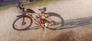 Bicicletă  cu  motor  de  firmă
