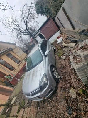 Opel Astra H sw 2005 1.7 Cdti - imagine 10