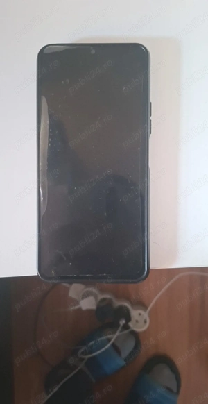 vand telefon redmi 13c 