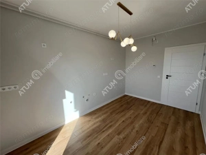 Apartament la cheie cu 2 camere gradina si parcare zona Brana Selimbar - imagine 2