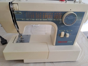 Mașina de cusut Necchi 559