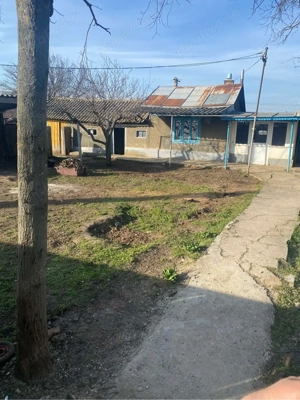 vand casuta la tara