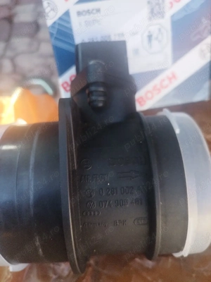 Vând senzor debitmetru aer Touran Bosch original