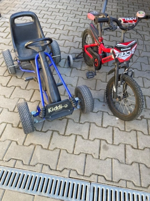 Ofer bicicleta și cart
