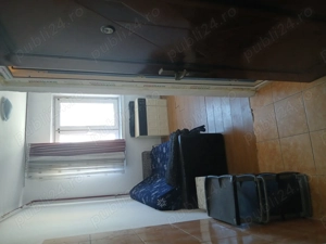 Vând Garsoniera în Bals județul Olt  etajul 4 vedere pe față scara 2 are gaze  - imagine 2