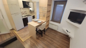Garsoniera cu curte in centru, 19mp, renovata, toate utilitățile sunt incluse in pret - imagine 9