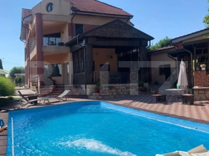 Casa P+1+M cu piscina si 1057 mp de teren, pozitionata inedit - imagine 2