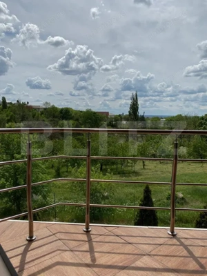 Casa P+1+M cu piscina si 1057 mp de teren, pozitionata inedit - imagine 9