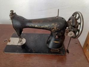 Mașina de cusut Singer 