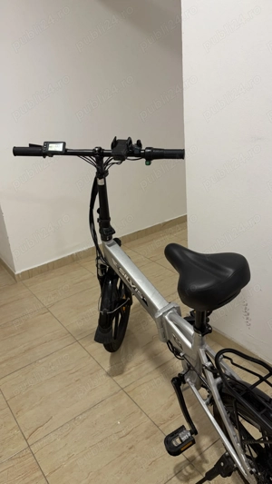 Bicicletă electrică plieabila .