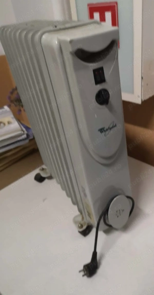 Calorifer ulei 9 elemenți, radiator electric 2000 W Whirlpool, 99 lei, tel. O75I 55 I I 49