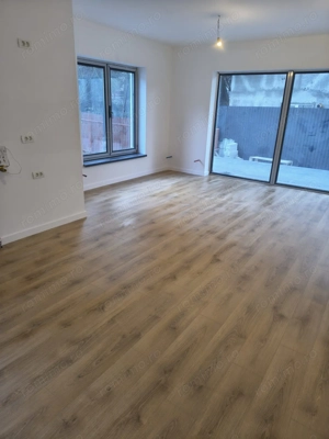 Apartament cu 2 camere 49,35 mp + 21,35 mp terasele + loc de parcare - Busteni