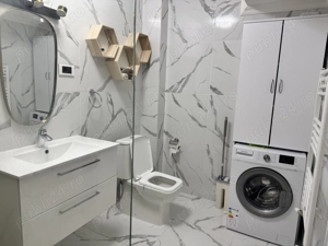 Ofer spre închiriere apartament 2 camere cu loc de parcare 