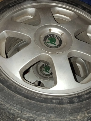 Jante originale Skoda/Design cu șase spițe cu capac central inclus!  