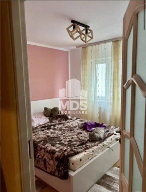 Decomandat cu 2 b #259;i si 2 balcoane la etajul 3 - imagine 12