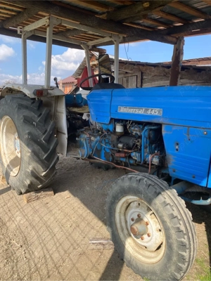 vand tractor u445 cu cositoare si grebla