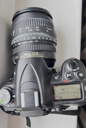 Nikon D7000 cu obiectiv 18-105, F3.5-5 6+ un obiectiv de 35 cu F 1.8