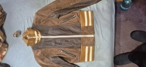 Vând geaca din piele, piele întoarsă si textil.