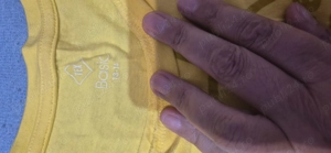 Vând tricou firma tex culoare galben.