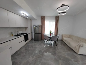 Vând apartament ultramodern cu 3 camere + grădină și terasă - imagine 2
