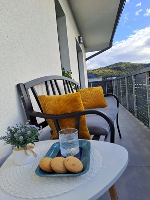 Dau în chirie apartament cu 2 camere  - imagine 10