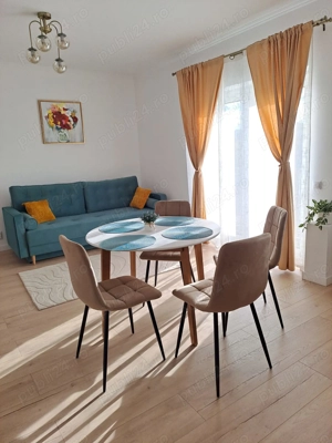 Dau în chirie apartament cu 2 camere  - imagine 5