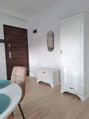 Dau în chirie apartament cu 2 camere  - imagine 7
