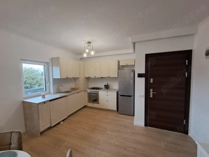 Dau în chirie apartament cu 2 camere  - imagine 4