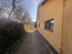 Casă spațioasă cu 3 dormitoare, două terase și două fronturi–15 km de Bistrita - imagine 5