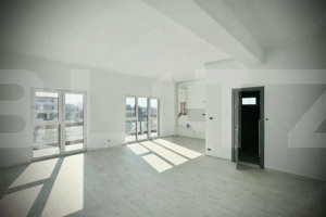 Apartament modern cu 2 camere, balcon generos și garaj interior cu telecomanda