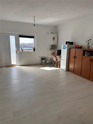 Apartament cu 2 camere  parter Casa Insiruita   Mosnita Veche - imagine 3
