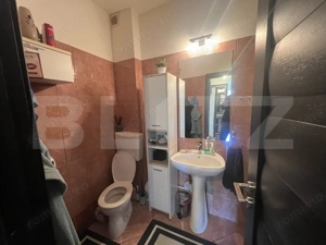 Casă de vânzare – 450 mp teren, zonă centrală și liniștită - imagine 10