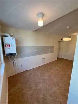 2 cam bloc de caramida etaj 1 loc parcare in curte centr proprie zona Balcescu - imagine 4