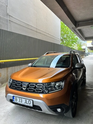 Dacia Duster 1.5 Blue DCI 4x4 140 cp Prestige 17" - imagine 4