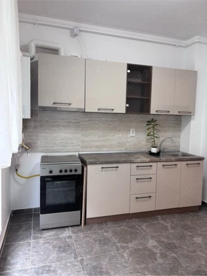 închiriez apartament nou, cu grădină - imagine 5