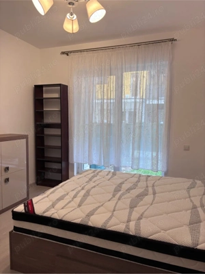 închiriez apartament nou, cu grădină - imagine 7