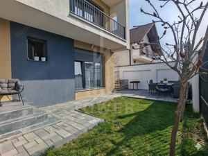 Apartament modern cu curte proprie – ideal pentru familie, zona Brana
