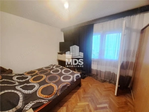 Decomandat la etajul 2 in bloc de caramida