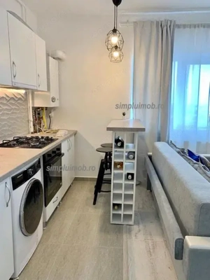 Centrala proprie bloc nou studio renovat mobilat Ozana - imagine 3