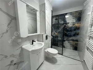 Apartament cu 4 camere si 2 bai situat in Selimbar zona Ion Ratiu - imagine 9