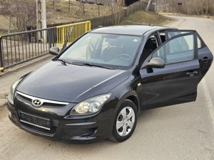 Hyundai i30 1.4 16v 109cp 2009 - imagine 8