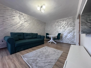 Închiriez apartament în centrul nou  - imagine 4