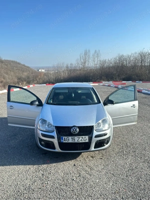 Vand Golf 5 2.0tdi BMM 8v(un singur ax cu came). 