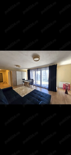 Inchiriez apartament cu 2 camere, 2 bai, o terasa generoasa si 1 loc de parcare inclus