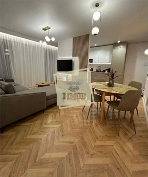 Apartament lux 3 camere 2 bai 3 balcoane 2 parcari si piscina