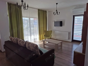 Închiriere apartament 2 camere (in bloc nou) + loc de parcare