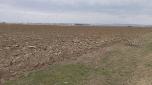 Teren la DN.Intrare ROMAN 29.950 MP. ZONA NOII AUTOSTRĂZI A7 deschidere la DN. 104m