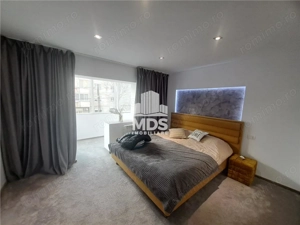 Etaj 1 cu 2 dormitoare  #537;i 2 balcoane, mobilat  #537;i utilat