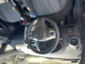 Opel Corsa D an 2009 - imagine 3